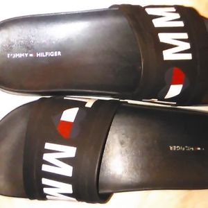 Like new, woman size 8,But can be worn by male black I ❤️ Tommy Hilfiger slides.